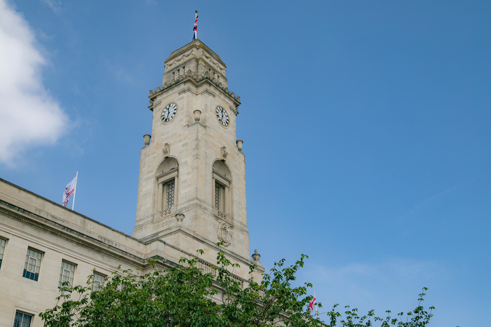Blue skys with clock tower out of focus
